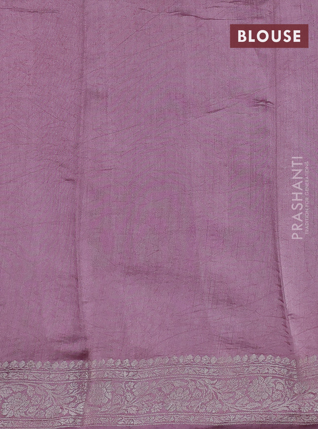 Pure organza partly silk saree pastel pink and pastel peach with silver zari stripe pattern and silver zari woven border