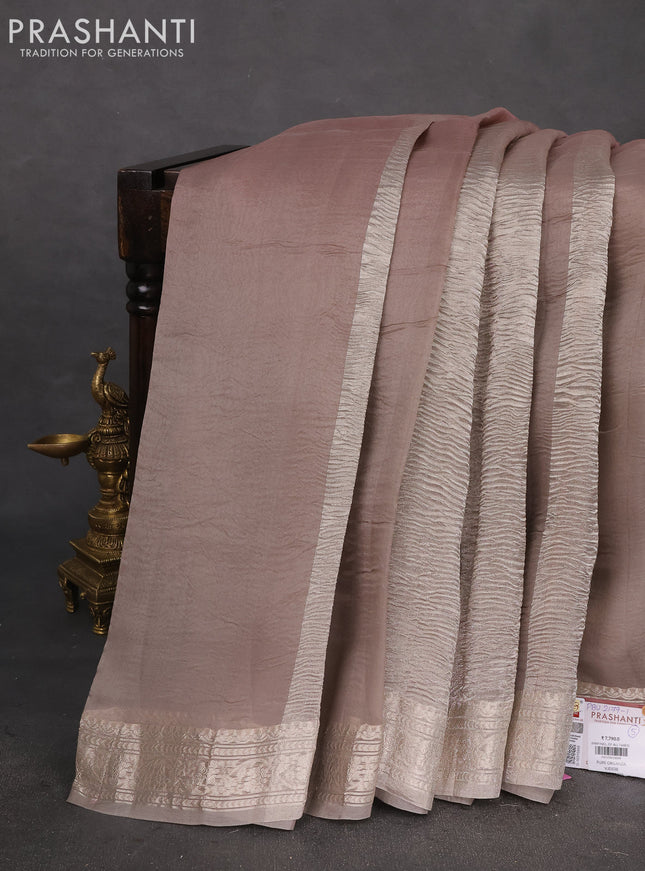 Pure organza partly silk saree grey and pastel peach with silver zari stripe pattern and silver zari woven border