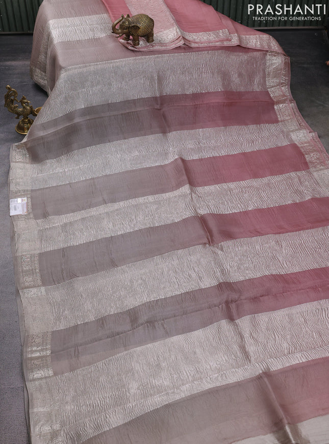 Pure organza partly silk saree grey and pastel peach with silver zari stripe pattern and silver zari woven border