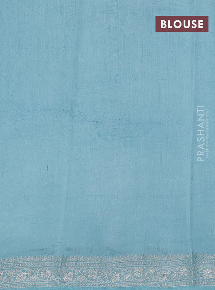 Pure organza partly silk saree grey and pastel blue with silver zari stripe pattern and silver zari woven border
