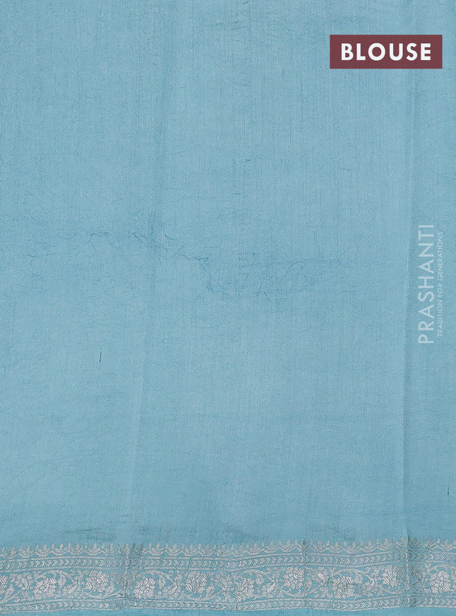 Pure organza partly silk saree grey and pastel blue with silver zari stripe pattern and silver zari woven border