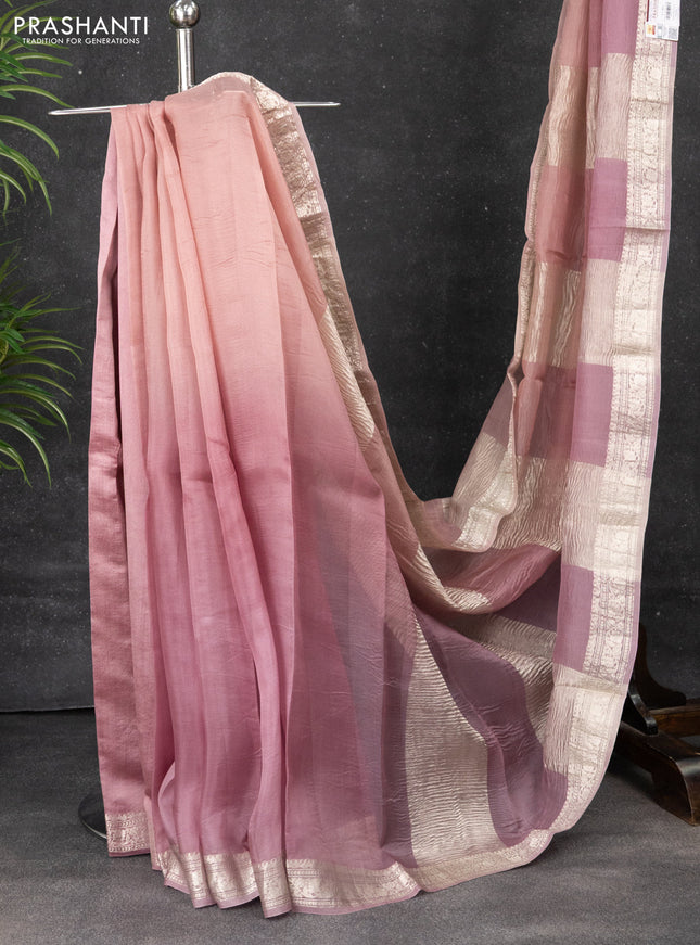 Pure organza partly silk saree pastel peach and pastel pink with silver zari stripe pattern and silver zari woven border