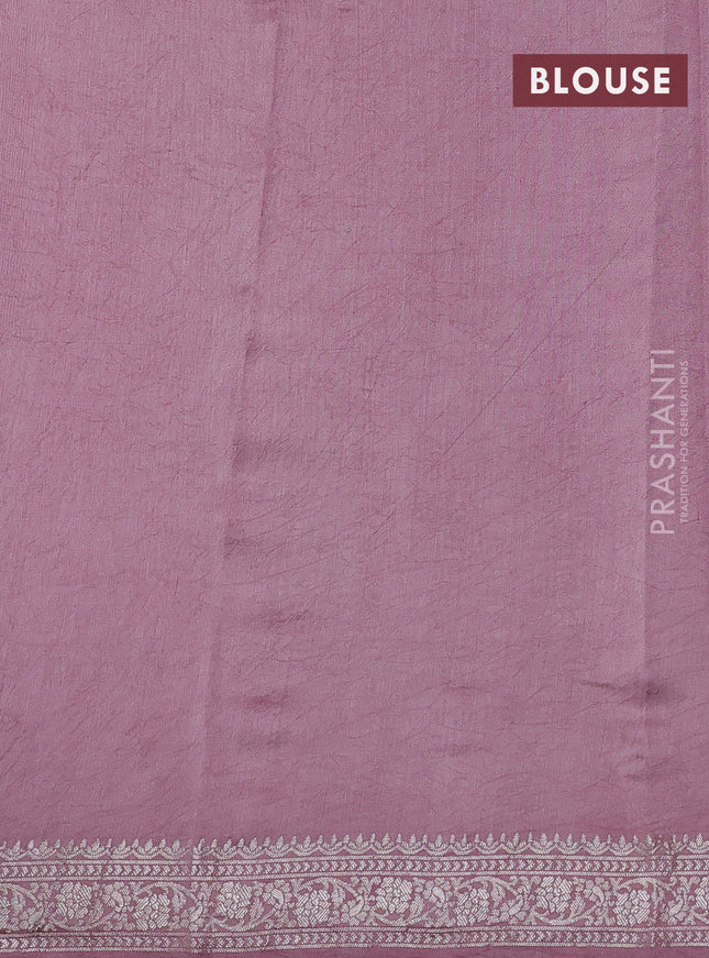 Pure organza partly silk saree pastel peach and pastel pink with silver zari stripe pattern and silver zari woven border
