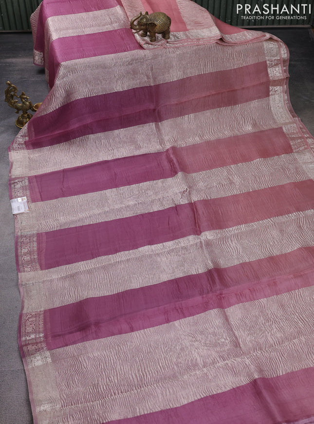 Pure organza partly silk saree pastel peach and pastel pink with silver zari stripe pattern and silver zari woven border