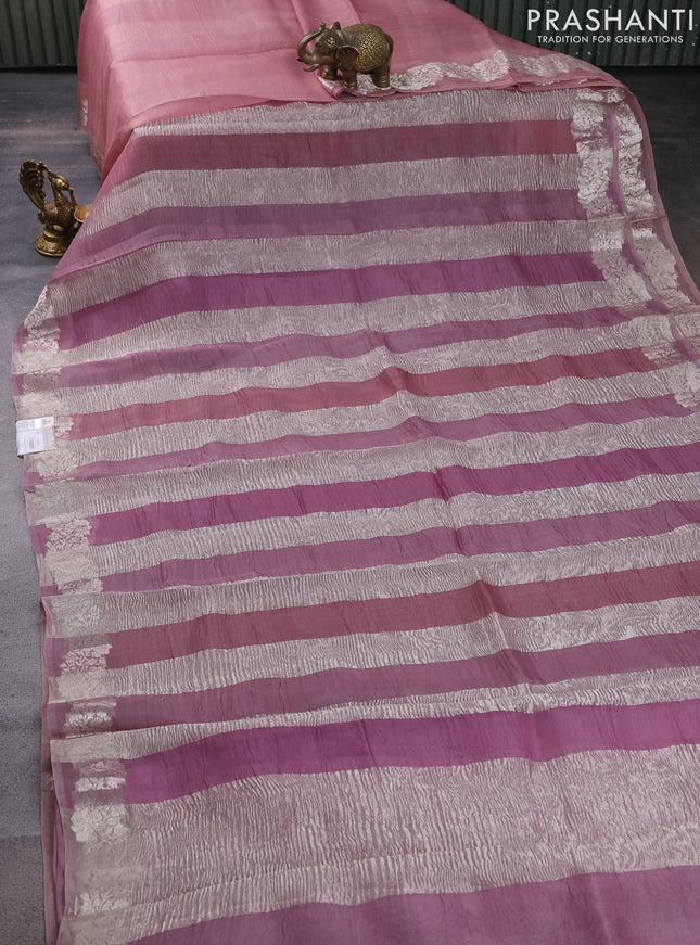 Pure organza partly silk saree pastel pink with silver zari stripe pattern and silver zari woven border