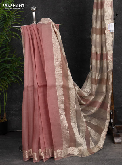 Pure organza partly silk saree beige and pastel peach with silver zari stripe pattern and silver zari woven border