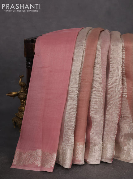 Pure organza partly silk saree beige and pastel peach with silver zari stripe pattern and silver zari woven border