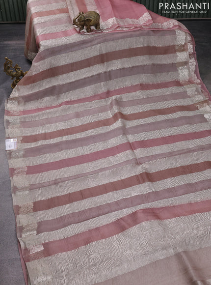 Pure organza partly silk saree beige and pastel peach with silver zari stripe pattern and silver zari woven border