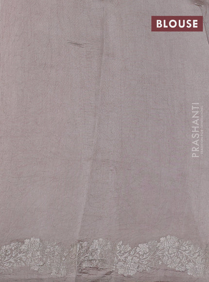 Pure organza partly silk saree beige and pastel peach with silver zari stripe pattern and silver zari woven border