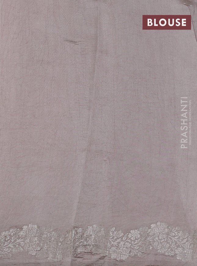 Pure organza partly silk saree beige and pastel peach with silver zari stripe pattern and silver zari woven border