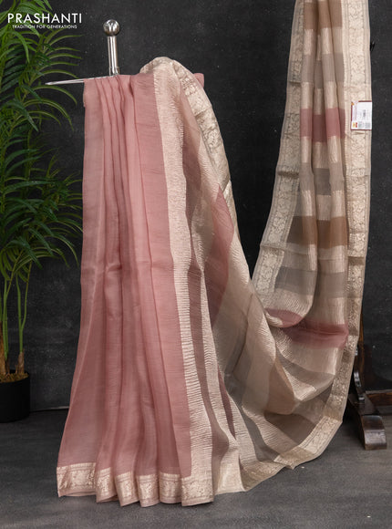 Pure organza partly silk saree grey shade and peach pink with allover silver zari weaves and silver zari woven border