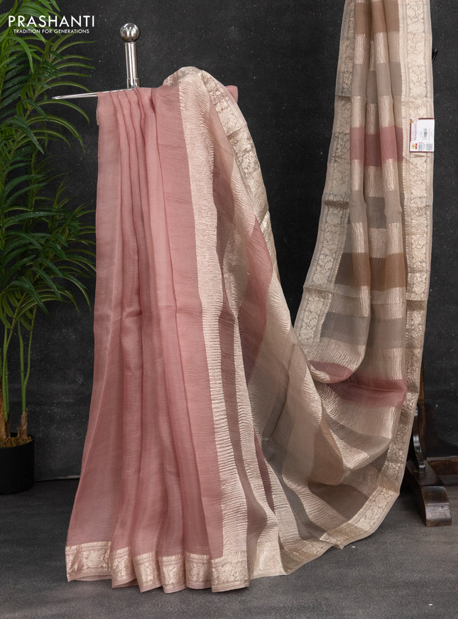 Pure organza partly silk saree grey shade and peach pink with allover silver zari weaves and silver zari woven border
