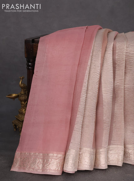 Pure organza partly silk saree grey shade and peach pink with allover silver zari weaves and silver zari woven border