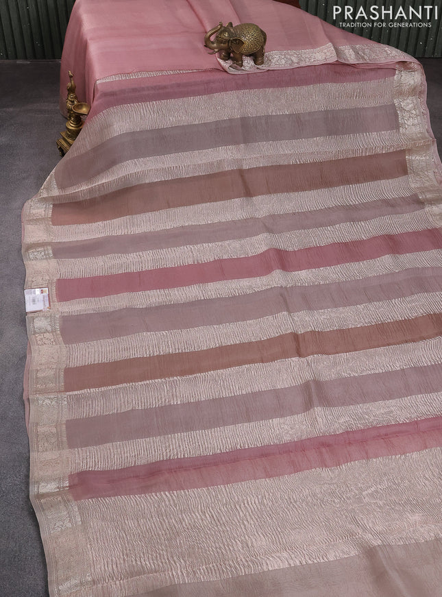 Pure organza partly silk saree grey shade and peach pink with allover silver zari weaves and silver zari woven border