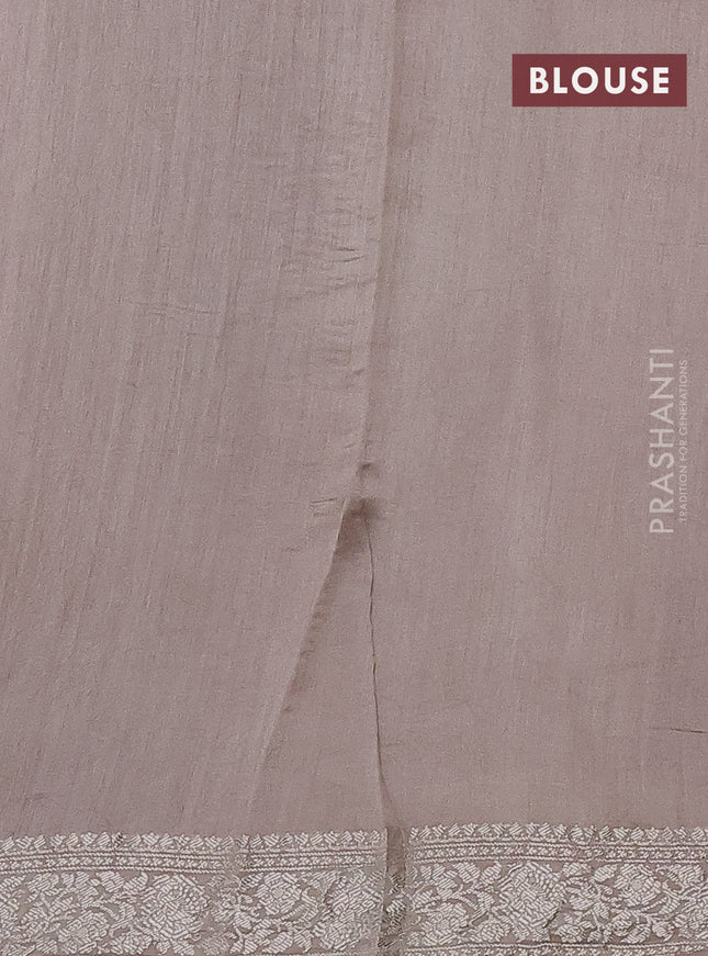 Pure organza partly silk saree grey shade and peach pink with allover silver zari weaves and silver zari woven border