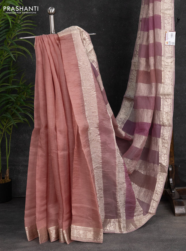 Pure organza partly silk saree pastel pink with allover silver zari weaves and silver zari woven border