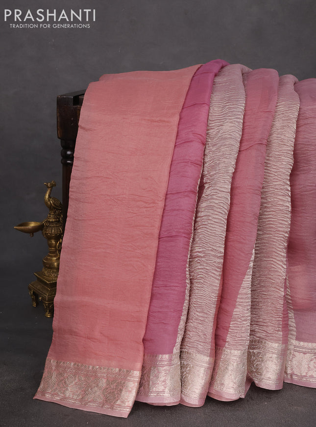 Pure organza partly silk saree pastel pink with allover silver zari weaves and silver zari woven border