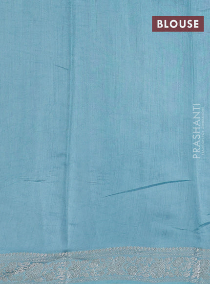 Pure organza partly silk saree pastel blue with allover silver zari weaves and silver zari woven border