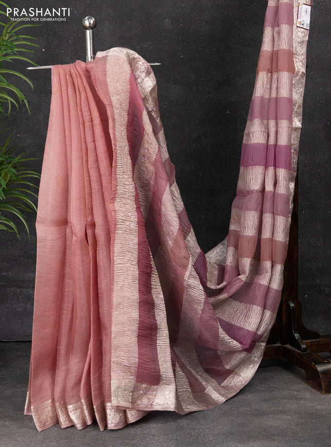 Pure organza partly silk saree pastel lavender and pastel pink with allover silver zari weaves and silver zari woven border