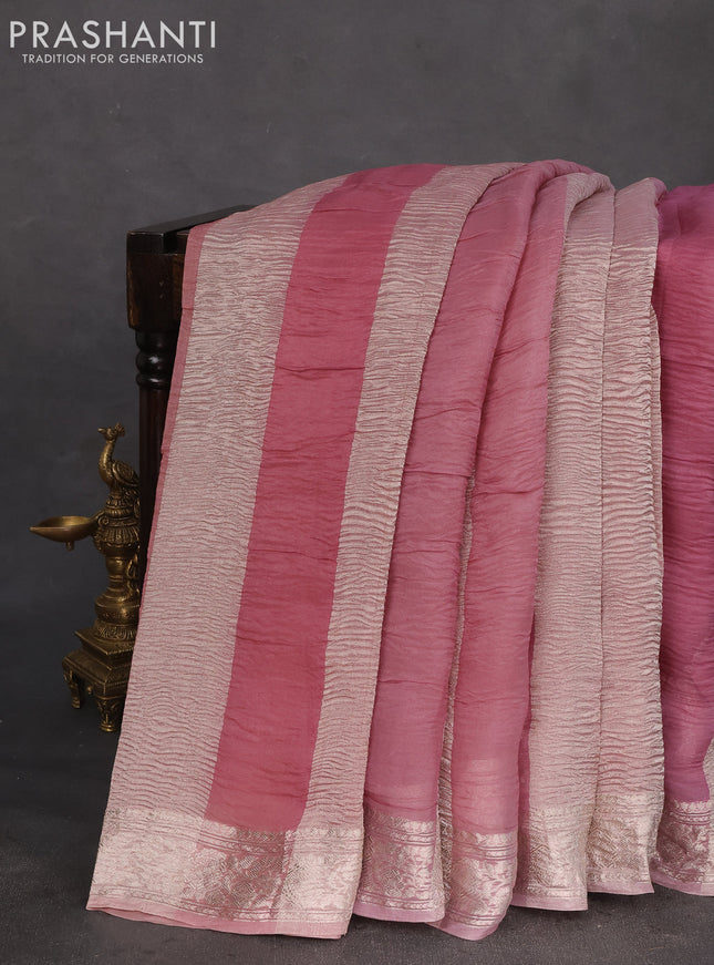 Pure organza partly silk saree pastel lavender and pastel pink with allover silver zari weaves and silver zari woven border