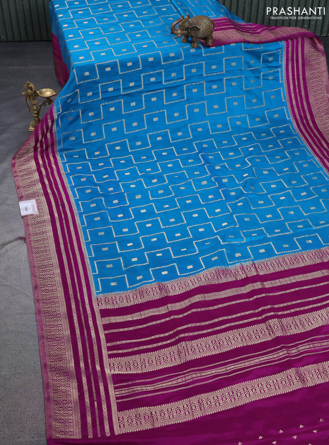 Banarasi semi crepe saree cs blue and purple with allover geometric zari weaves and zari woven border