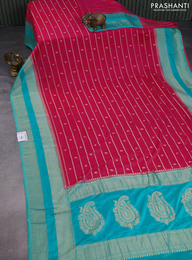 Banarasi semi crepe saree pink and teal blue with allover zari weaves & buttas and rettapet zari woven border