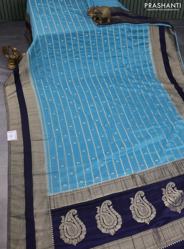 Banarasi semi crepe saree pastel blue and navy blue with allover zari weaves & buttas and rettapet zari woven border