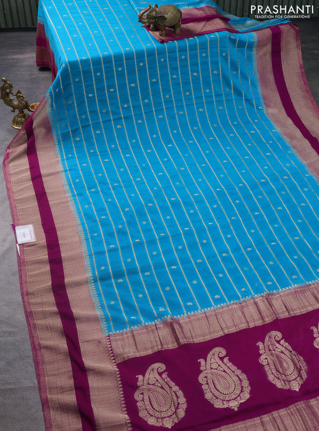 Banarasi semi crepe saree cs blue and purple with allover zari weaves & buttas and rettapet zari woven border