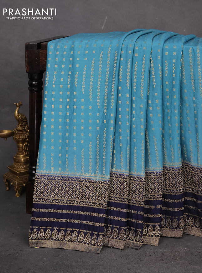 Banarasi semi crepe saree pastel blue and navy blue with allover zari woven butta weaves and zari woven border