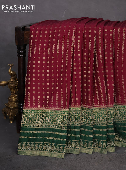 Banarasi semi crepe saree maroon and green with allover zari woven butta weaves and zari woven border
