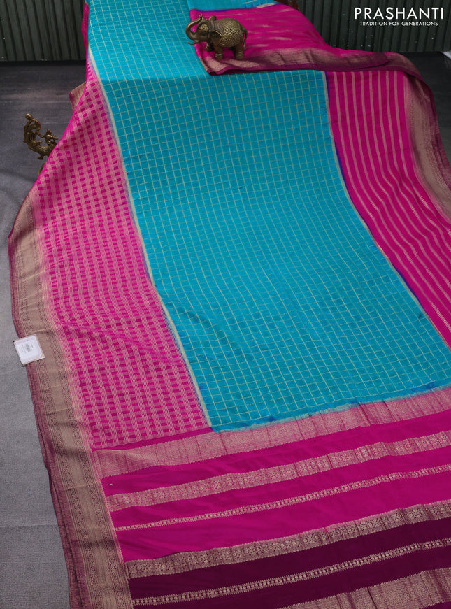 Banarasi semi crepe saree teal blue and pink wine shade with allover zari checked pattern and zari woven border