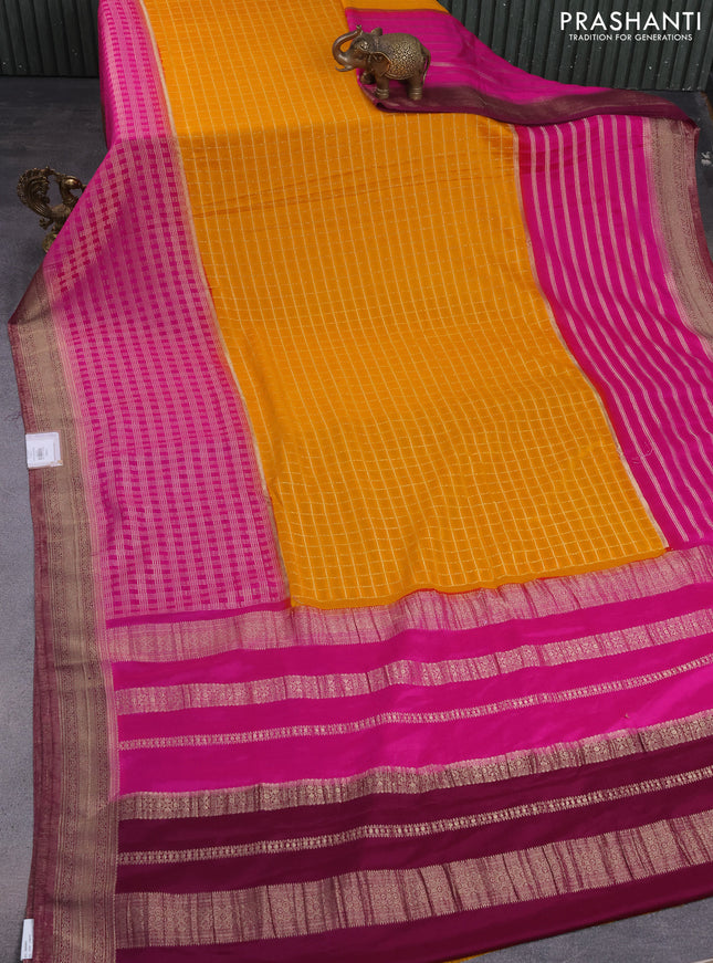 Banarasi semi crepe saree mango yellow and pink purple with allover zari checked pattern and zari woven border