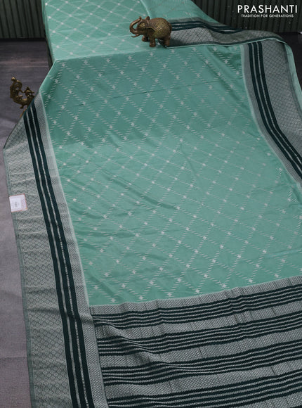 Banarasi semi crepe saree pastel green and dark green with allover silver zari weaves and silver zari woven border