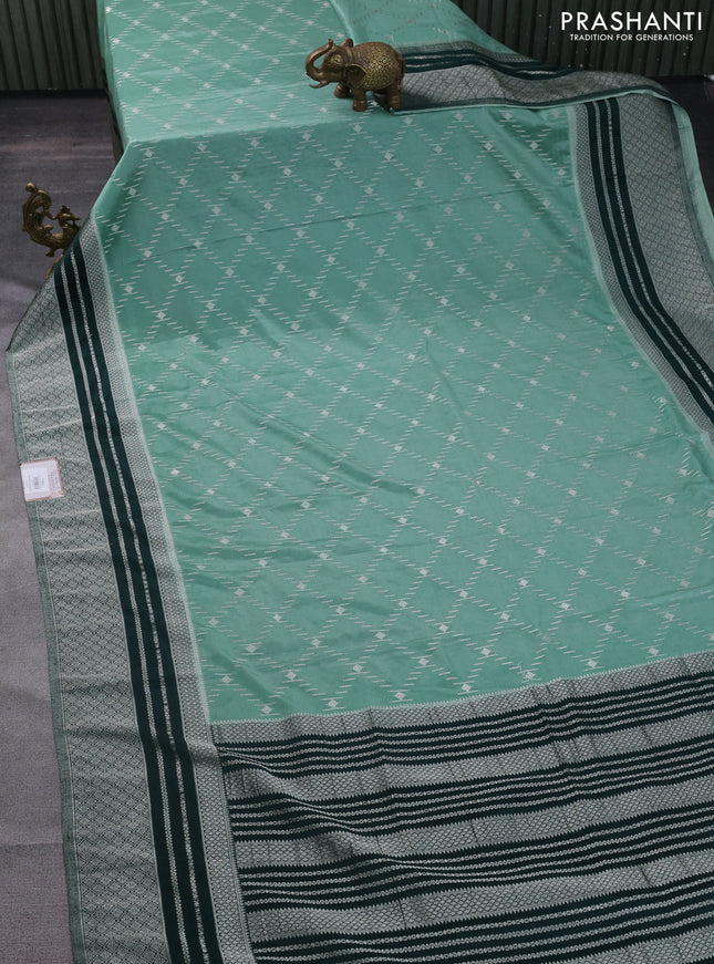 Banarasi semi crepe saree pastel green and dark green with allover silver zari weaves and silver zari woven border