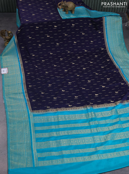Banarasi semi crepe saree navy blue and teal green with allover zari woven butta weaves and long zari woven border