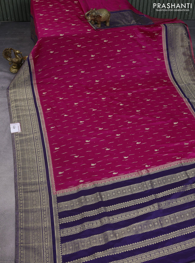 Banarasi semi crepe saree pink and navy blue with allover zari woven butta weaves and long zari woven border