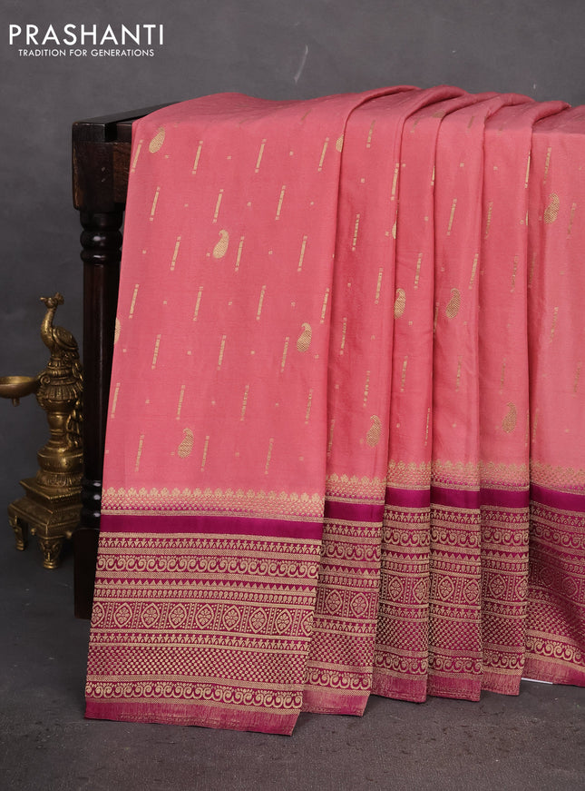 Banarasi semi crepe saree peach pink and purple with allover zari woven butta weaves and long zari woven border