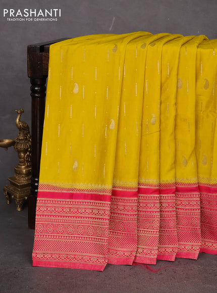Banarasi semi crepe saree yellow and pink with allover zari woven butta weaves and long zari woven border