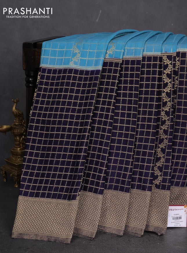 Banarasi semi crepe saree pastel blue and navy blue with allover zari checked pattern and long zari woven border
