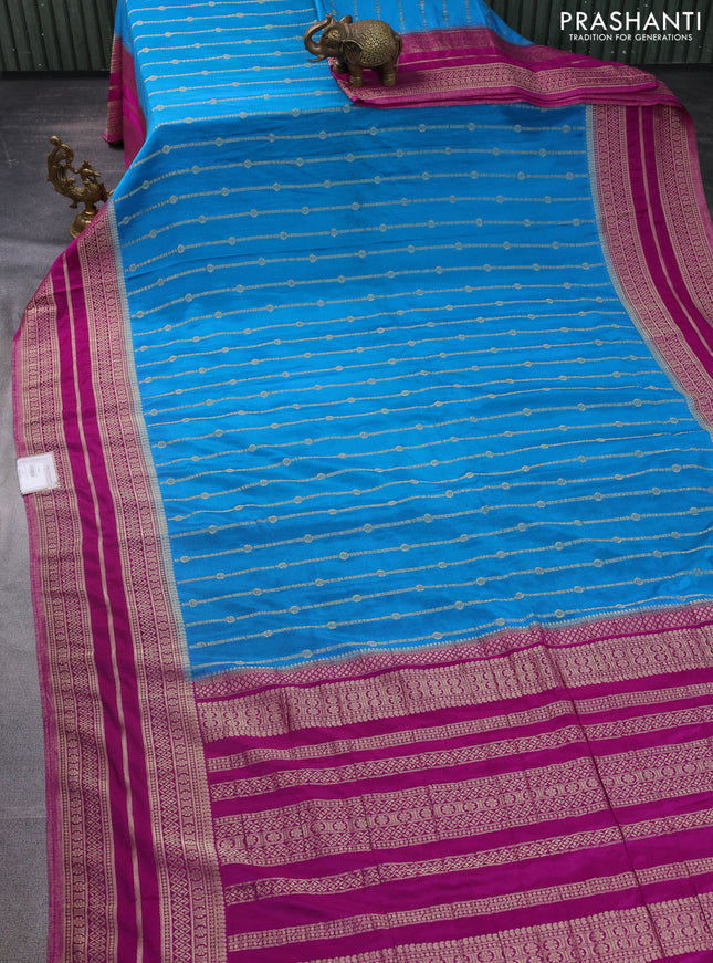 Banarasi semi crepe saree cs blue and purple with allover zari weaves and zari woven border