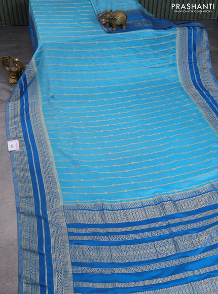 Banarasi semi crepe saree light blue and cs blue with allover zari weaves and zari woven border