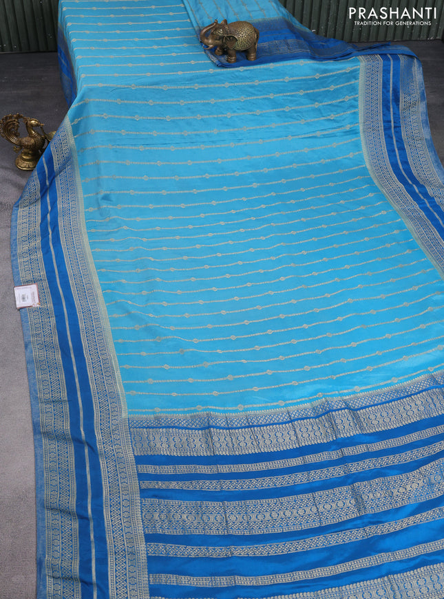 Banarasi semi crepe saree light blue and cs blue with allover zari weaves and zari woven border