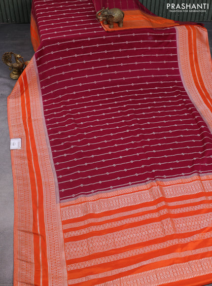 Banarasi semi crepe saree maroon and orange with allover zari weaves and zari woven border
