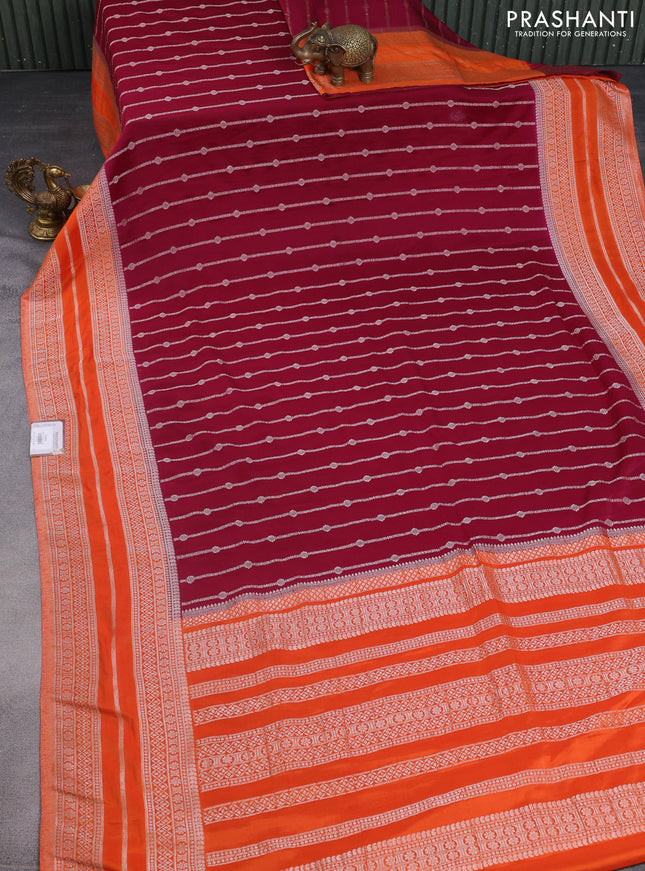 Banarasi semi crepe saree maroon and orange with allover zari weaves and zari woven border