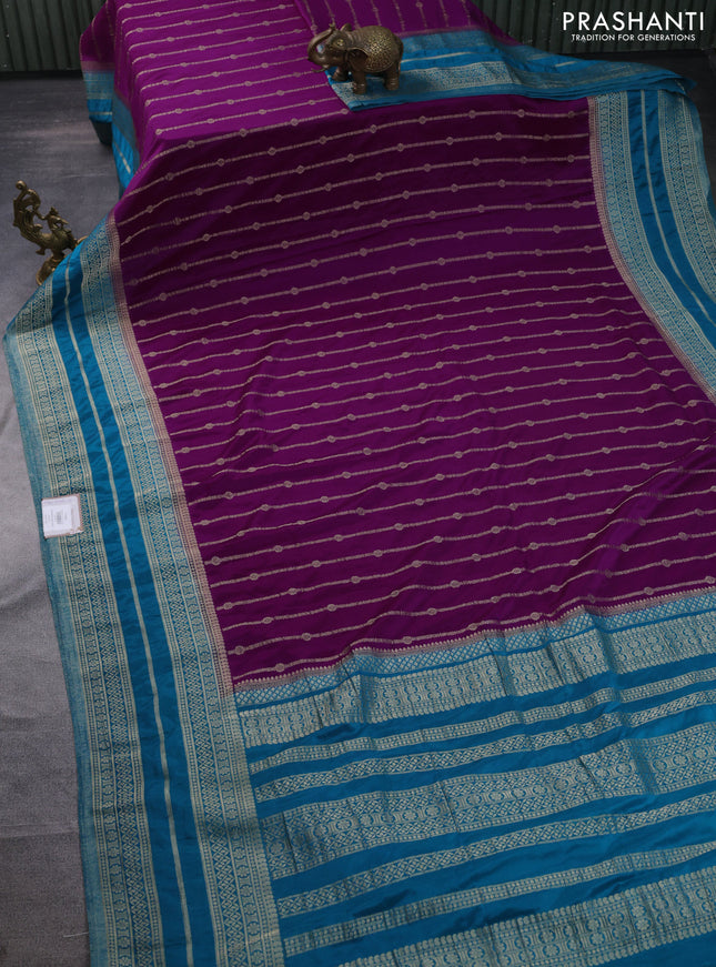 Banarasi semi crepe saree purple and teal blue with allover zari weaves and zari woven border