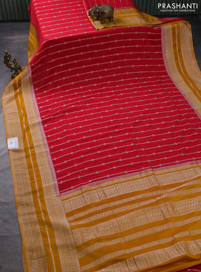 Banarasi semi crepe saree red and mustard yellow with allover zari weaves and zari woven border