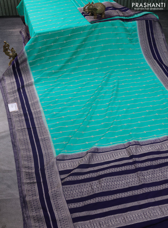 Banarasi semi crepe saree teal green and navy blue with allover zari weaves and zari woven border