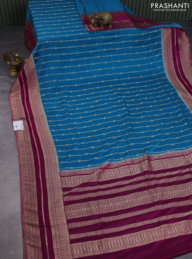Banarasi semi crepe saree cs blue and purple with allover zari weaves and zari woven border