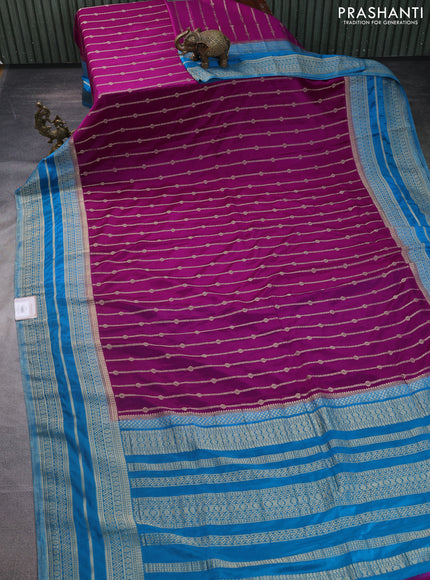 Banarasi semi crepe saree purple and cs blue with allover zari weaves and zari woven border