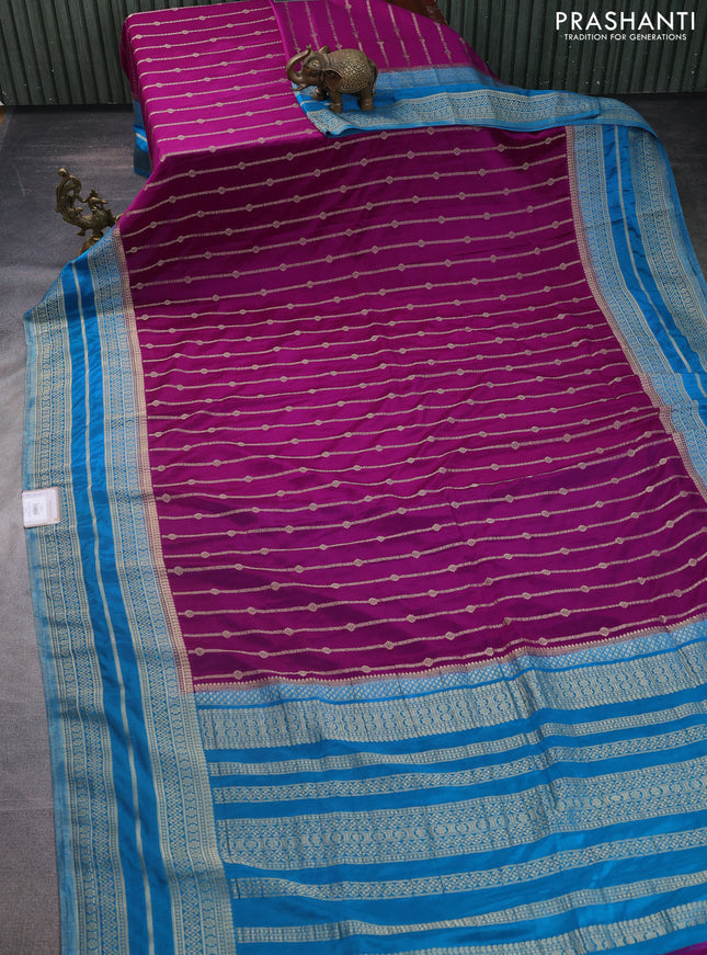 Banarasi semi crepe saree purple and cs blue with allover zari weaves and zari woven border